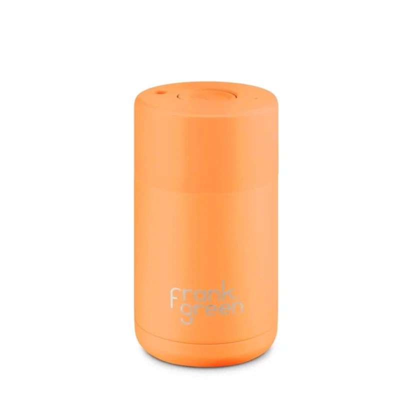 Frank Green Ceramic thermal mug in neon orange with a capacity of 295 ml, BPA-free, ideal for travel.
