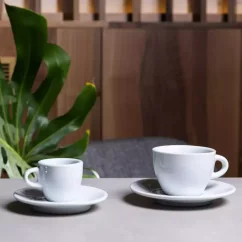 A 160 ml cup with a saucer in a delicate white colour, perfect for serving tea or coffee.