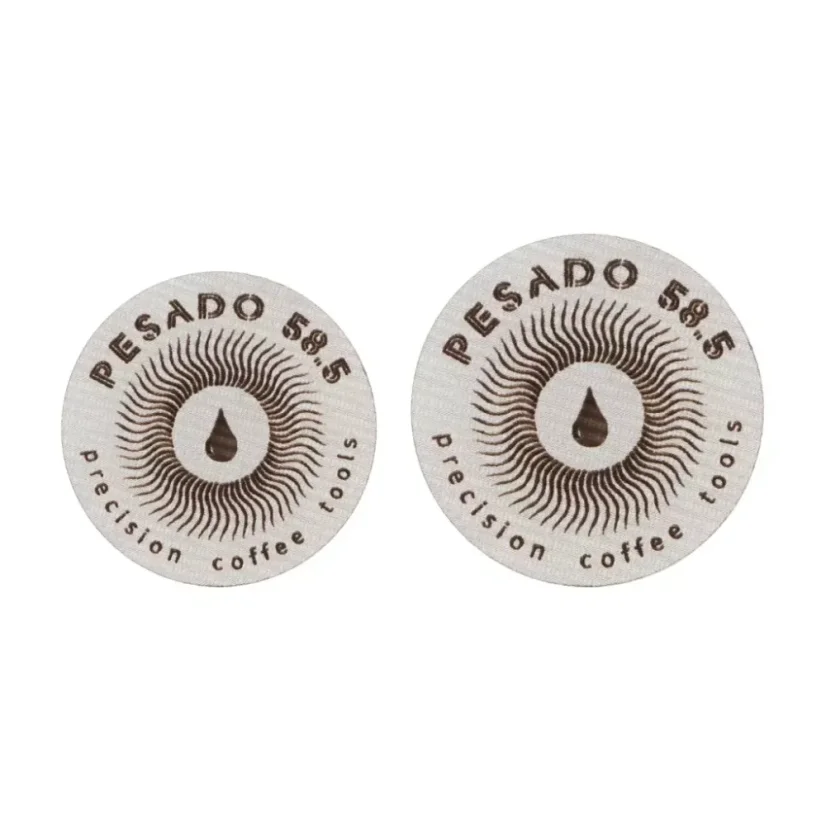 Filtre en acier inoxydable Pesado d'un diamètre de 58,5 mm pour une répartition parfaite du café dans votre panier à expresso.
