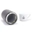 Detail of the thermos cup body with coffee in the background.