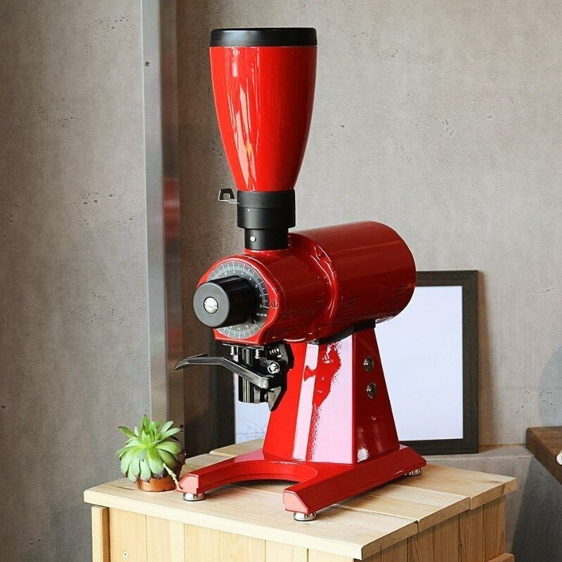 Professional espresso grinder and filter Mahlkönig EK43S in red. Source.