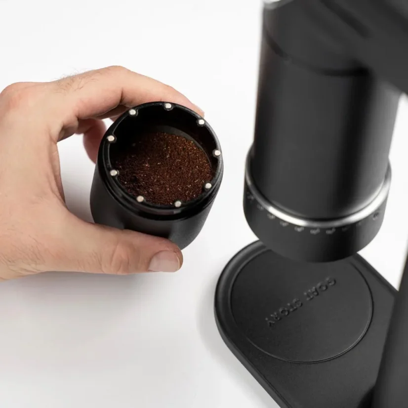 Acro 2-in-1 magnetic coffee grinder with ground coffee container
