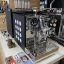 Home lever coffee machine Rocket Espresso Appartamento in black and white with a steam wand for easy milk frothing.