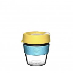 Plastic coffee mug with yellow lid and turquoise strap for holding.