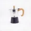 Silver moka pot with a black water spout and wooden handle from the Forever Miss Moka Woody brand.