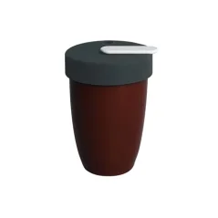 Brown Loveramics Nomad travel mug with a 250 ml capacity, specially designed for comfortable use in a stroller.