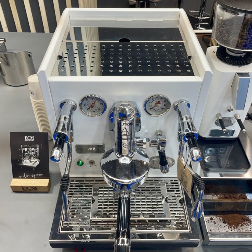 ECM Synchronika, white home espresso machine with an automatic cleaning system.