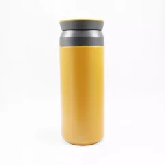 View of the yellow Kinto Travel Tumbler Coyote 500ml insulated mug