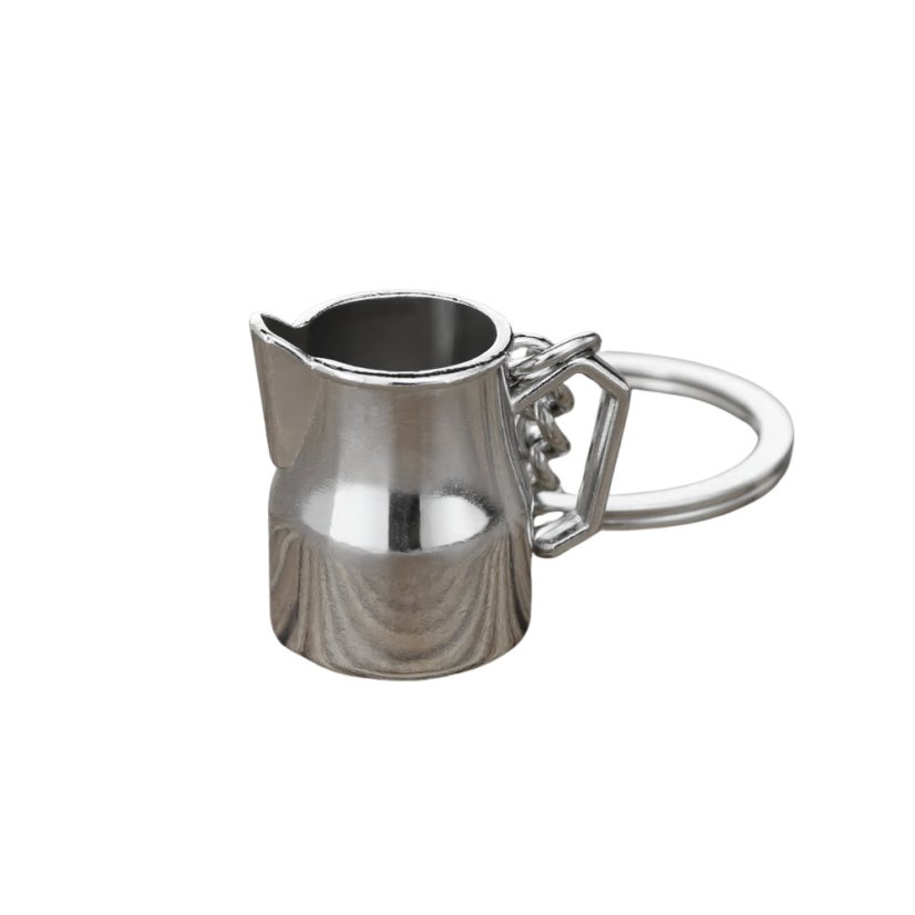 Eine silberne Milchkanne als Schlüsselanhänger ist das perfekte Geschenk für Kaffeeliebhaber.