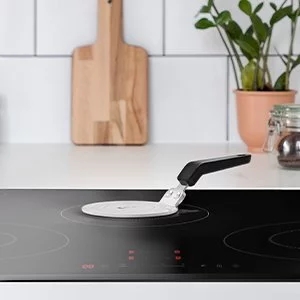 Induction hob on a kitchen induction cooktop.
