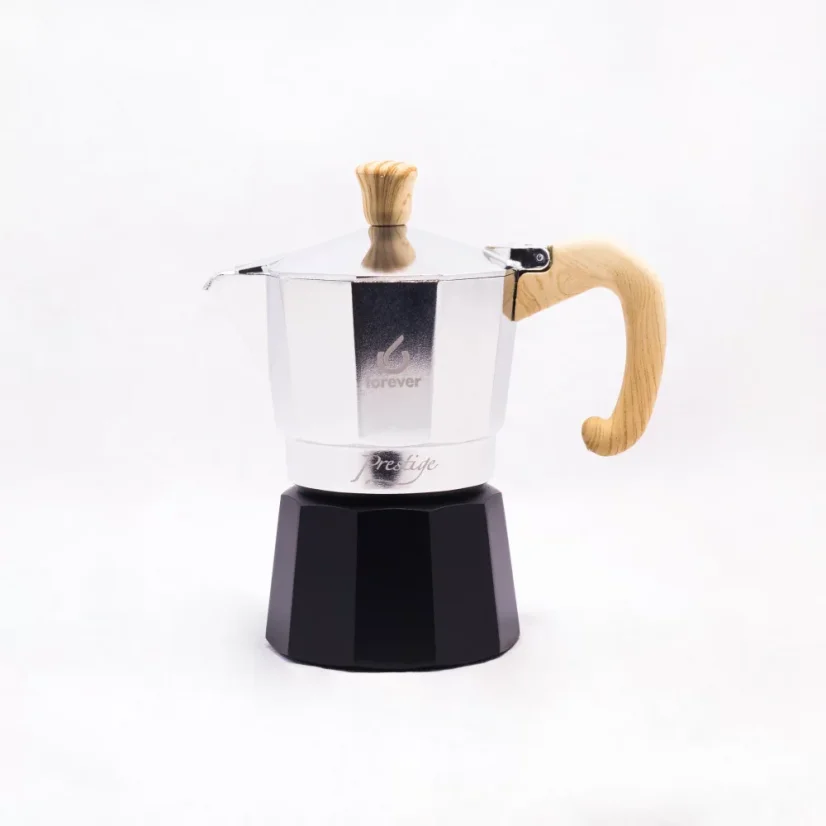 Silver moka pot for 3 servings of coffee with a wooden handle and black spout by Forever Miss Moka Woody