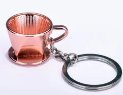 Copper dripper JoeFrex, a stylish keychain perfect for coffee lovers.