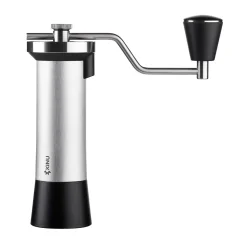 Manual coffee grinder by Kinu M47 Classic with a black hopper in a silver finish and conical burrs.