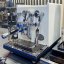 ECM Synchronika lever espresso machine in white finish, suitable for home use.