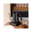 The black Timemore Fish Smart Pro digital kettle with a capacity of 900 ml is perfect for quick and precise water boiling.