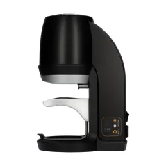 Black automatic coffee tamper Puqpress Q2 with a diameter of 53 mm for consistent coffee preparation. Black automatic coffee tamper Puqpress Q2 with a diameter of 53 mm for consistent coffee preparation.