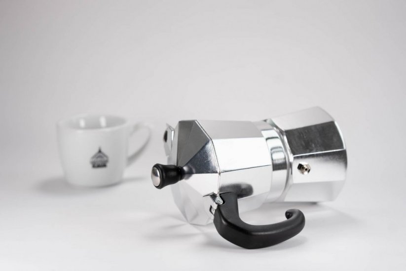 Aluminum moka teapot for 1 cup and a cup of Spa coffee