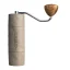 Manual coffee grinder Comandante X25 Trailmaster with 39 mm grinding stones, perfect for preparing perfectly ground coffee.