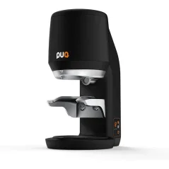 Automatic coffee tamper Puqpress Mini in black color.