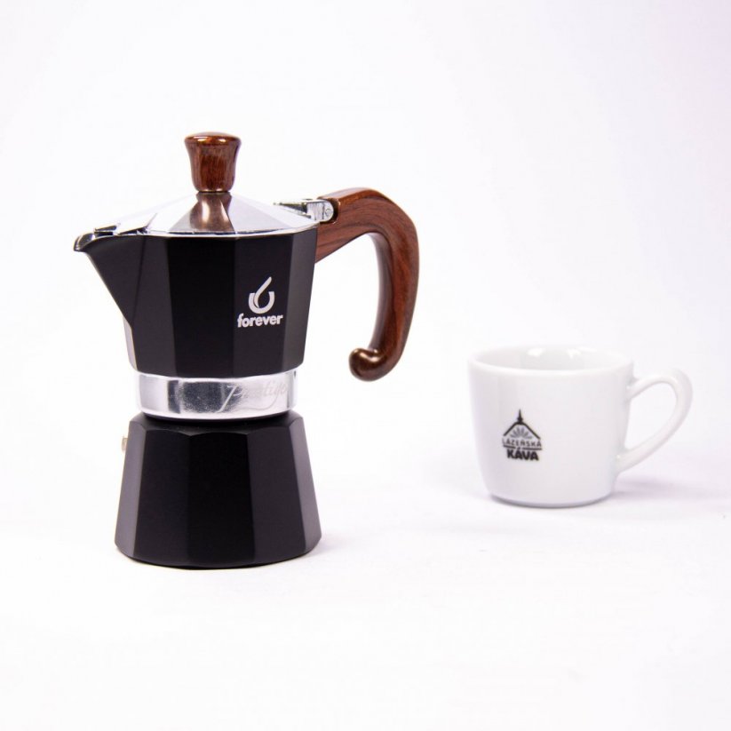 Le pot à moka Forever Prestige Radica à côté de la tasse à espresso avec le logo Spa Coffee.
