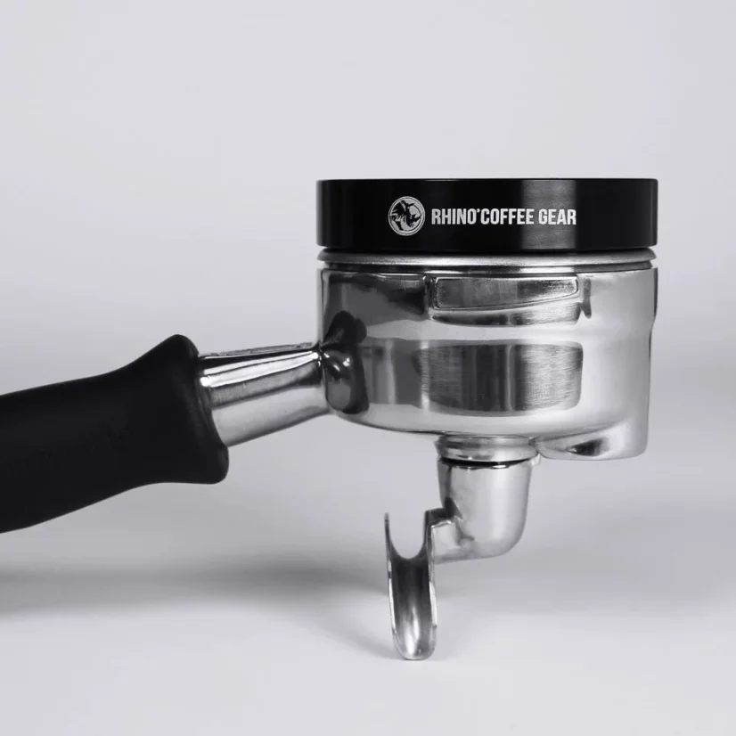 Stainless steel dosing funnel with a diameter of 58 mm for precise dosing of ground coffee.