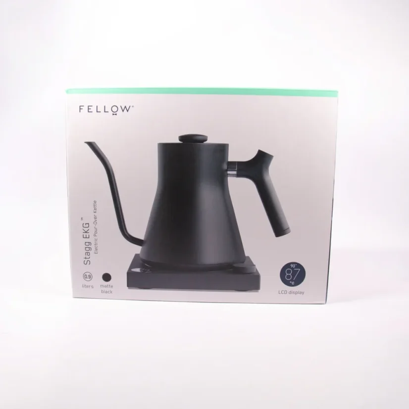 Black electric kettle in original packaging on a white background