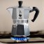 Bialetti Moka Express teapot on a gas stove.