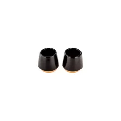 Two black ceramic Fellow Junior Demitasse espresso cups with a 70 ml capacity, ideal for ristretto.