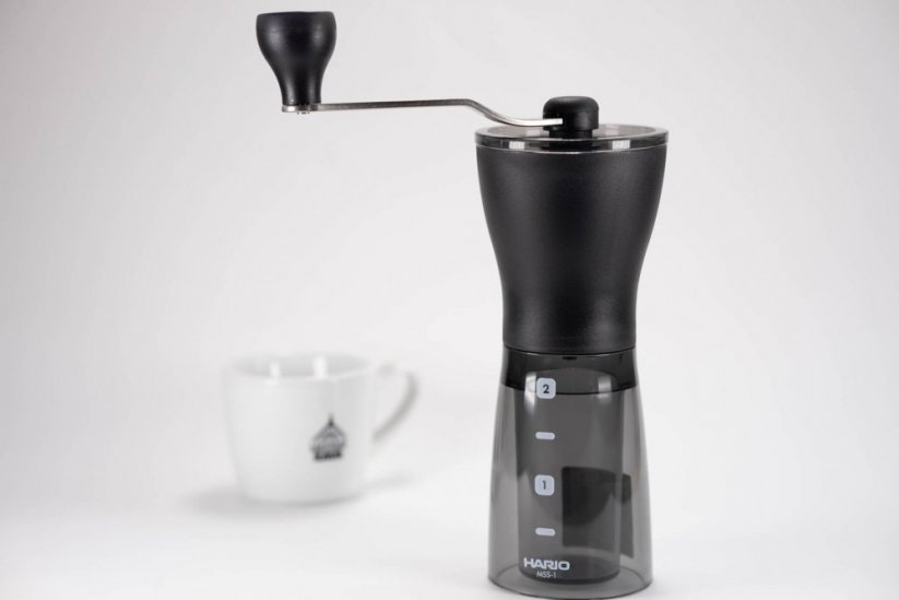 Black grinder Hario Mini Mill Slim Plus and Spa Coffee