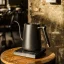 Black Timemore Mini Fish Smart Pour Over Thin kettle with a capacity of 600 ml, perfect for coffee brewing.