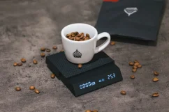 Timemore Black Mirror Nano used for weighing coffee.