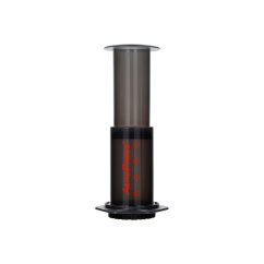 Plastic AeroPress on a white background.