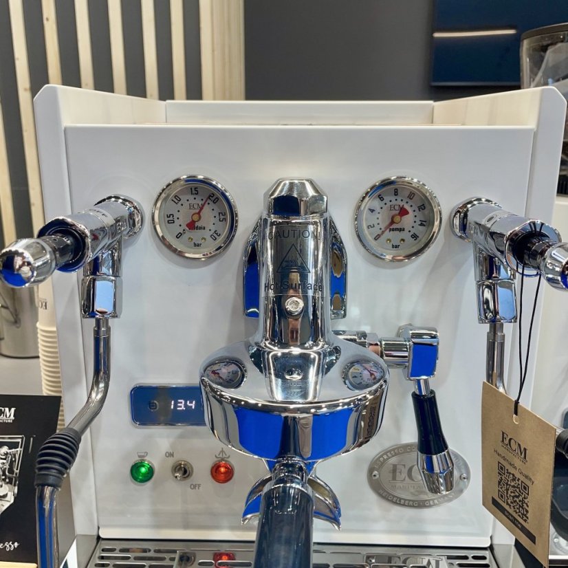Home espresso machine in white with hot water function for tea.