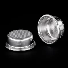 Two silver IMS baskets on a black background, viewed from below and inside.