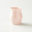Sensorische Tasse aus rosa Porzellan.