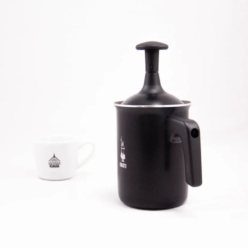 Side view of a black Bialetti Tuttocrema milk frother with a 166ml capacity on a white background, accompanied by a cup with a coffee logo.