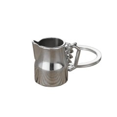 Une petite théière à lait en argent comme porte-clés est un cadeau idéal pour les amateurs de café. Une petite théière à lait en argent comme porte-clés est un cadeau idéal pour les amateurs de café.