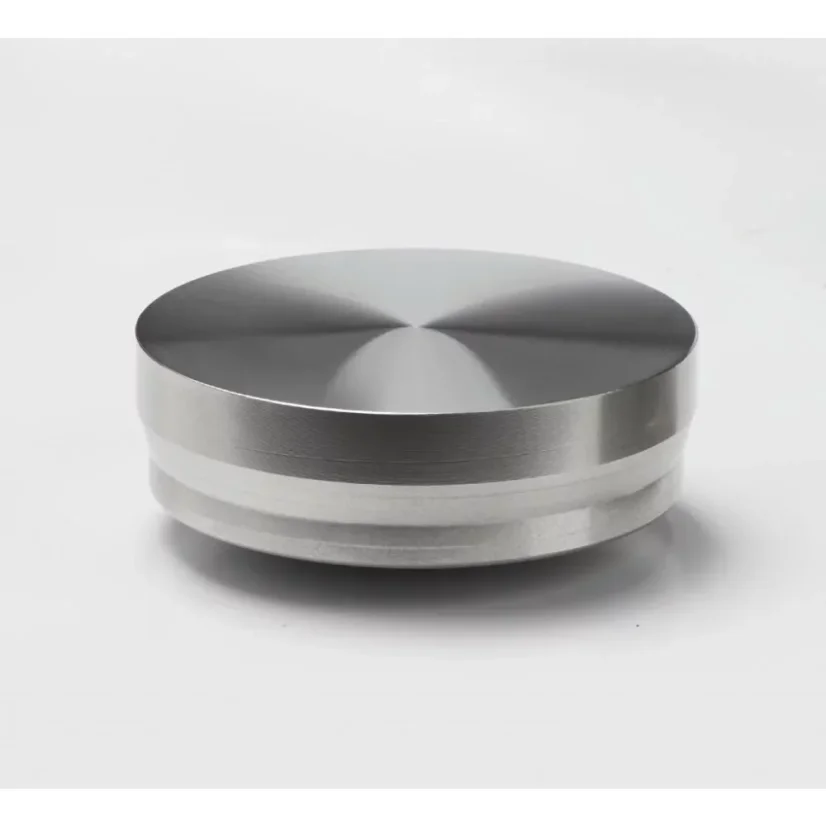 Puqpress Q1, tamper automático y su base.