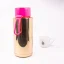Ceramic thermos from the back with coffee in the background