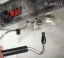 Using a cleaning brush for the coffee machine head. Using a cleaning brush for the coffee machine head.