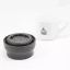 View of a part of the lid of the Kino Travel Tumbler Coyote 500ml thermos, with a cup of coffee in the background. View of a part of the lid of the Kino Travel Tumbler Coyote 500ml thermos, with a cup of coffee in the background.