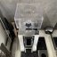 White Eureka Mignon Specialita 16CR espresso coffee grinder with display for easy control.