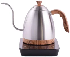 Silver electric kettle with wooden handle on a black base on a white background