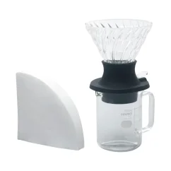 Hario Immersion Dripper set with server and paper filters.