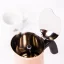 Bialetti New Venus moka pot for 4 cups on a white background with a cup of coffee, view into the interior of the pot.
