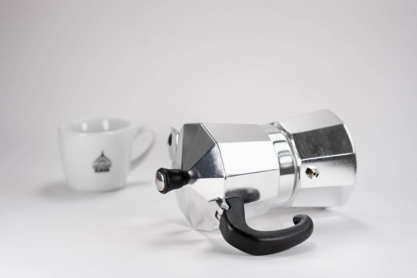 Silver teapot for 9 cups and a cup of Spa coffee