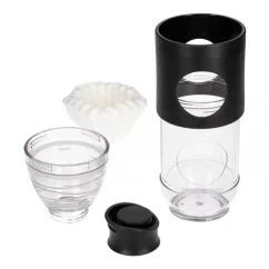Cafetera negra Cafflano Go-Brew, ideal para preparar café mientras viajas.