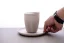 Huskee Natural Saucer on the table