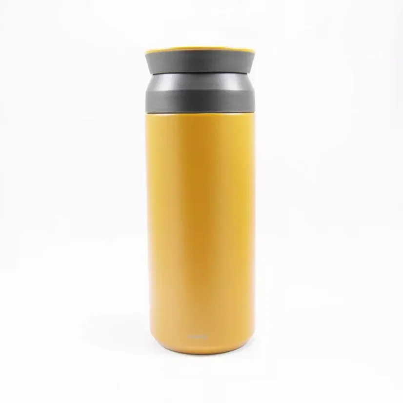 View of the yellow Kinto Travel Tumbler Coyote 500ml insulated mug