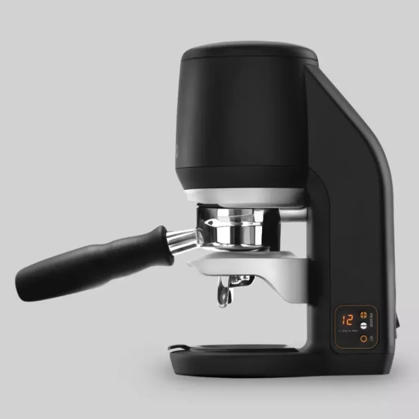 Presseur automatique Puqpress Mini en couleur noire.